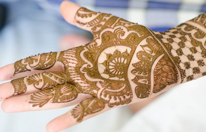 2. Detailed Floral Arrangements Royal Front Hand Mehndi Design